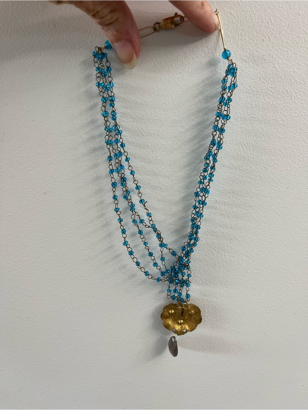 Blue Beaded Multi-Strand Necklace with Gold Floral Pendant